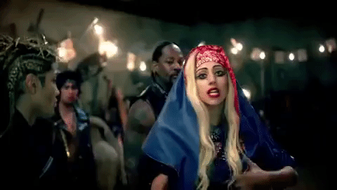 Песня девчонки хана видео. Леди Гага Judas. Кадр в клипе леди га с гранатом.