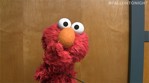 Gif of Elmo blowing a kiss