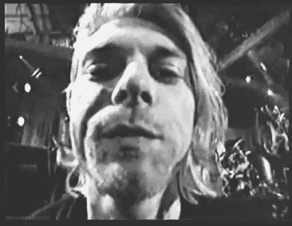 Сплевывать слюну. Курт Кобейн плюет в камеру. Nirvana Live and Loud Курт Кобейн. Плевок гиф.