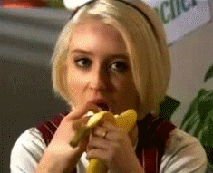 Swallowed gif. Девушка с бананом гиф. Блондинка с бананом. Девушка ест банан гифка. Гифки с бананом во рту.