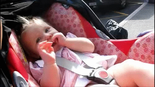 little girl in car seat gif