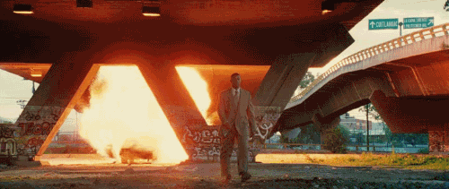 walking away from explosion gif