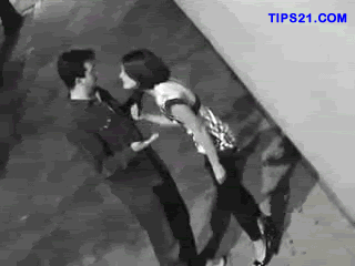man punching woman gif