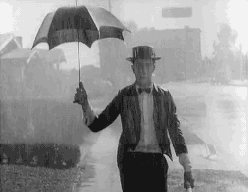 buster keaton,vintage,walking in the rain
