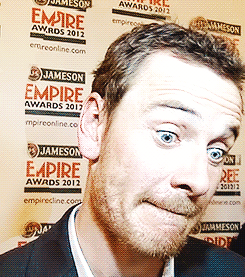 michael fassbender,interview,by a teal colored apple,and his face,in which the apple attempts to make peace with yellow,just look at this fucking shark