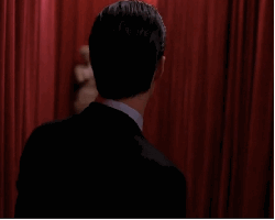 man,twin peaks,serious,statue,curtain