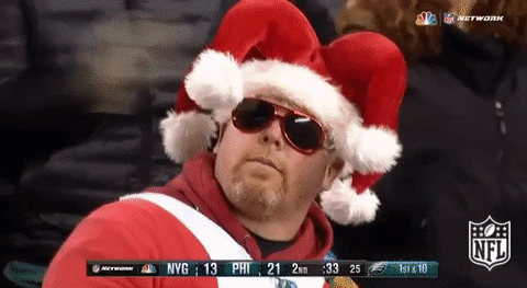 football,nfl,fan,sunglasses,relax,chill,santa hat