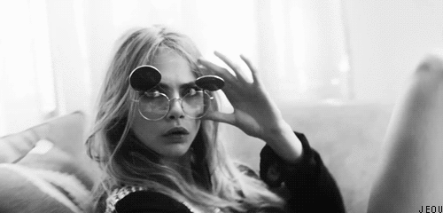 lovey girl,lovey lady,lovey woman,black and white,funny,lovey,girl,hot,model,fun,black,woman,cara delevingne,white,victorias secret,blonde,tired,sunglasses,glasses,lady,and,girly,cara,funny face,delevingne