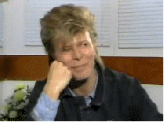 david bowie,mullet,funny,celebrities,smile,photoset,interview,adorable,old school,david bowie interview,expression,bowie,get up,glass spider,big hair,fluffy hair,touching face