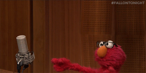 Elmo dancing GIF.