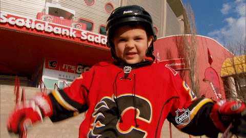 nhl,excited,hockey,celebration,kid,fans,ice hockey,flames,nhl playoffs,stanley cup playoffs,2017 stanley cup playoffs,calgary flames,calgary,nhl fans