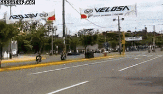 fail,kid,home video,motorcycle,yikes,close call,phew,racetrack