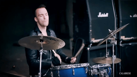 music video,spin,drums,rock and roll,punk rock,leather jacket,warehouse,death rock,calabrese,dark rock,calabrese band,bobby calabrese,jimmy calabrese,davey calabrese,bass guitar,i wanna be a vigilante