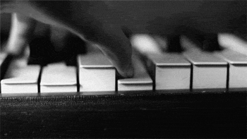 playing piano,piano keys,piano,black and white,hand