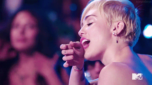 Miley cyrus sad crying GIF.