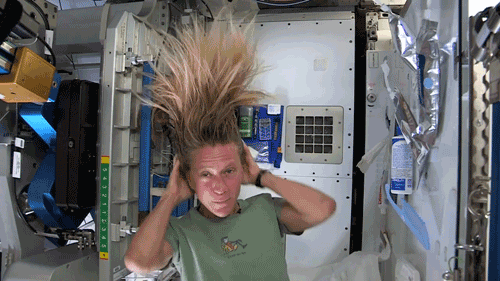 science,hair,international space station,zero gravity,sometimes the water gets away from you and you try to catch as much of it as you can
