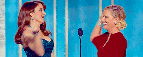 laughing,smiling,amy poehler,tina fey,high five,golden globes