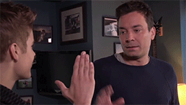 This Gif is about high five,handshake,hand hug,tv,television,justin bieber,...