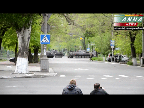 ukraine,fire,fight,watch,men,street,middle,sit