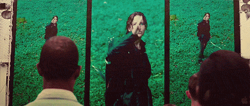 movie,jennifer lawrence,crowd,catching fire,hunger games,hand gesture