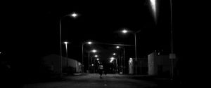 a girl walks home alone at night