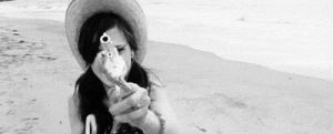 black and white,beach,photoshoot,zooey deschanel,guns,shoot,zooey deshanel photoshoot