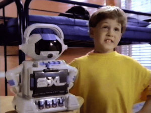 1990s,robots,commercials,tiger electronics,and he was so adorable with it too,her crush on him was so adorable,like at the end and aw