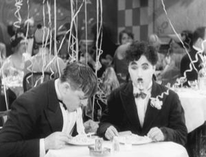 charlie chaplin,hungry,eating,noodles,spaghetti