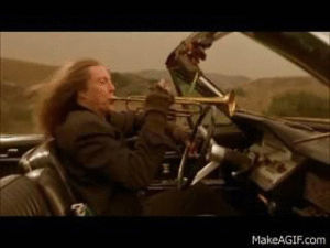 christopher walken playing a trumpet and driving,christopher walken,life,im so happy this exsits,yeeaa