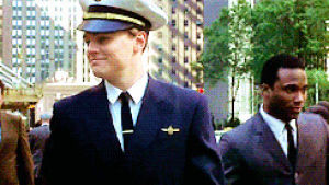 catch me if you can,smiling,leonardo dicaprio,walking,costume,pilot,frank abagnale
