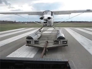 plane,trailer,sea,from,off,truck,takes