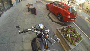 motorcycle,guy,cars