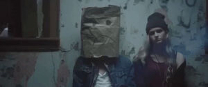 music video,party,sad,drunk,bag,hiding,hide,epitaph records,sad face,too close to touch,nerve endings