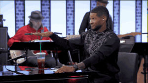 tv,television,nbc,the voice,usher,ersher,usher wants,is he reaching for someone,or a sandwich