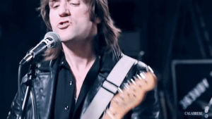 dark rock,music video,singing,punk rock,warehouse,leather jacket,death rock,calabrese,calabrese band,bobby calabrese,jimmy calabrese,davey calabrese,sneer,i wanna be a vigilante,born with a scorpions touch