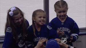 little girls,hockey,nhl,ice hockey,posing,canucks,photo shoot,vancouver canucks,nhl fans,canucks fans