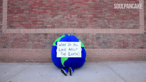 waiting,climate change,world,green,earth,sign,sitting,soulpancake,holding
