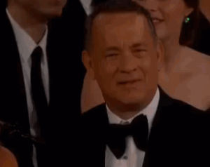 questioning,tom hanks,happy,smiling,what,confused