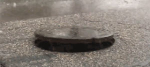 manhole,wtf,weird,hell,cover,levitating,popcorn