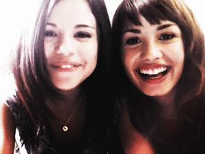 demi lovato,selena gomez,ill be making s of these two from their old videos for the next few daysweek d