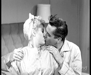 kissing,kiss,romance,valentines day,i love lucy,lucy and desi,comedy,television,lucy,black and white,lucille ball,classic tv,valentines card,conversation hearts