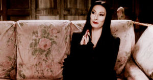 morticia addams,morticia,thinking,the addams family,plotting,look,looking,staring,stare,think,excellent,anjelica huston,planning