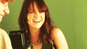 laughing,green,smiling,emma stone,photoshoot,bangs