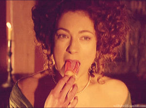moll flanders,alex kingston,loveually harassing a lobster claw with her glorious mouth