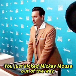 mickey mouse,johnny depp,disney,d23,but then again who doesnt,hes got a thing for mickey doesnt he