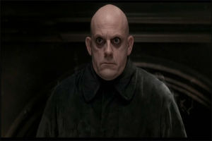 uncle fester,serious,unimpressed,the addams family,stunned,fester