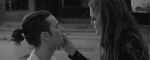 Cigarette smoke kiss GIF
