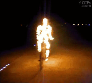 sculpture,burning man,bicycle,bike,ghost rider,art,other,kinetic,flaming,pyrotechnics