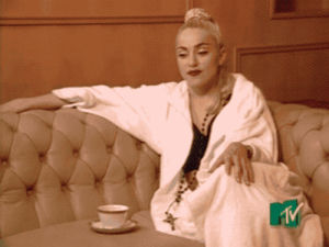 madonna,relaxed,drinking,unimpressed,robe,chilling,1990,mtv,ponytail,blond ambition,gaultier