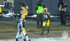 football,nfl,green bay packers,packers,rollins,chest bump,quinten rollins